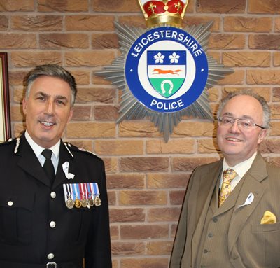 Chief Constable and Police &amp;amp; Crime Commissioner next to force crest