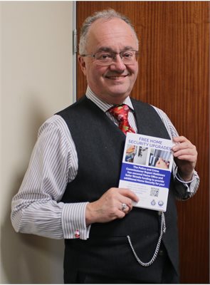 Rupert holding a Safer Streets leaflet
