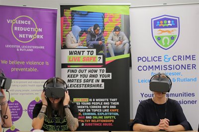 Young People with VR headsets on